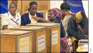 Workers in polling station