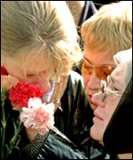 Family members of a seaman killed when the nuclear submarine Kursk sank in the Barents Sea