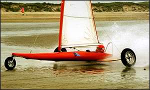 Typical sand yacht scene on a beach