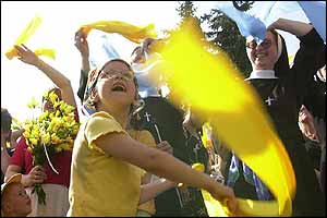 Crowd waves scarves