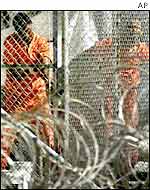 Prisoners at Guantanamo's Camp X-Ray - the precursor of today's Camp Delta