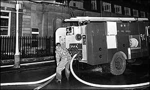 Soldier on fire fighting duty