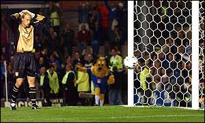 Aston Villa keeper Peter Enckelman makes a spectacular error in the clash with Birmingham City
