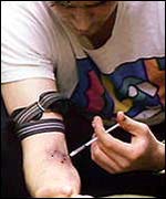 Drug user injecting