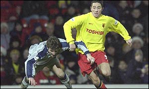 Tommy Smith (right) in action for Watford