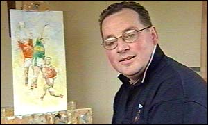 Armagh artist Seamus Duffy and the painting that the BBC offered for a prize