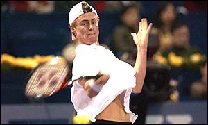 Australia's Lleyton Hewitt in action against Marat Safin at the Masters Cup