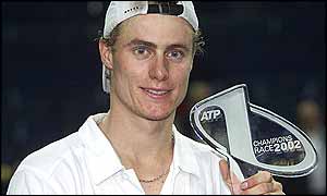Lleyton Hewitt poses with his ATP number one trophy