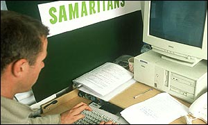 Man at computer in Samaritan office