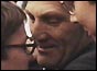 Tiede Herrema greets two of his sons after his release