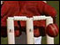 Close up of cricket stumps and wicket keeper's gloves