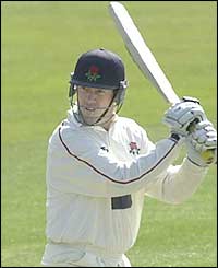 Stuart Law made an unbeaten 129 not out 