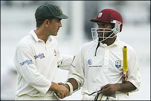 Australia's Justin Langer congratulates Shivnarine Chanderpaul on his century