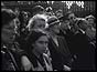 Crowds waiting by palace railings