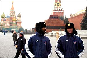 Wales players Nathan Blake and Gary Speed soak up the atmosphere in Moscow's Red Square ahead of their Euro 2004 qualifier