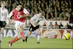 Robert Pires converts a penalty after Henry is adjudged to have been brought down by Johnsen