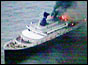 Fire visible at back of ship 