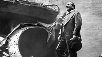 Sir Henry Wood surveys the bomb damage to Queen's Hall