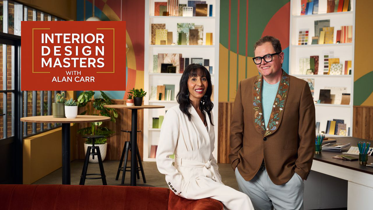 Michelle Ogundehin and Alan Carr beside Interior Deisgn Masters logo