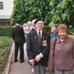 16 June 2004. Joe and Joan Toner at the Normandy Veterans Association Commemorative Service, St Nicholas' Gardens, Whitehaven. Joe and Joan had recently returned from 60th Anniversary Commemorations in Normandy a few days earlier. In 2004 the West Cumbria service was held on 16 June because many NVA Branch members were in Normandy on 6 June.