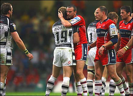 Paul Cooke, Hull KR, congratulates Hull FC players at Cardiff Millennium Magic