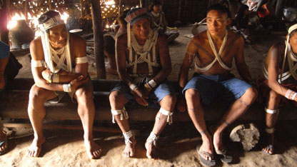 The warriors line up to take their turn to get stung