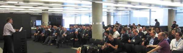 John Souter presents to the audience at the launch of IX Manchester. Credit Brandon Butterworth