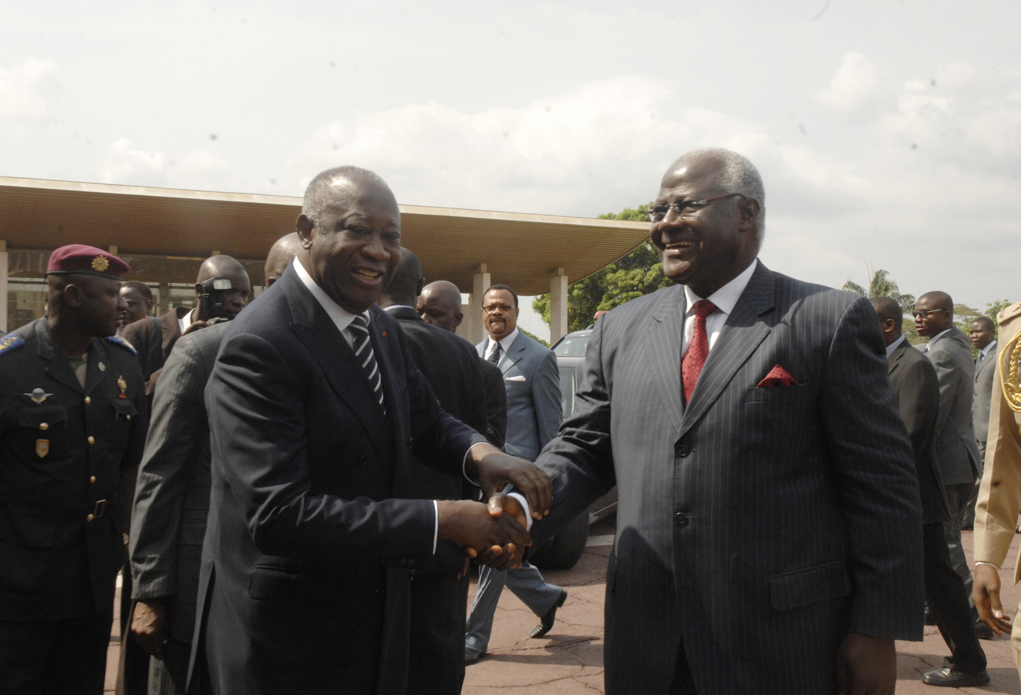 Ivory Coast incumbent president Laurent Gbagbo welcomes Sierra Leone President Ernest Bai Koroma, at the Presidential Palace in Abidjan, Ivory Coast, Tuesday, Dec. 28, 2010