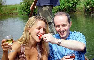 Helen with Huw, punting on the Cherwell