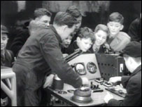 children being shown railway engineering