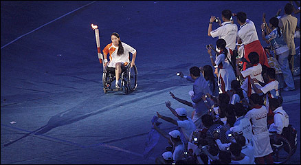 China's torchbearer and athlete Jin Jing 