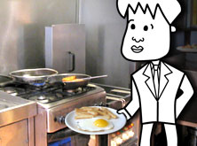 Tim in the cafe with a plate of egg and chips