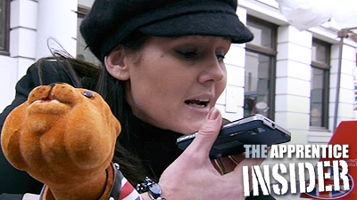 Natasha clutches her dog toy during a phone conversation.