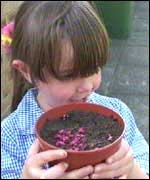 Katie with a plant pot