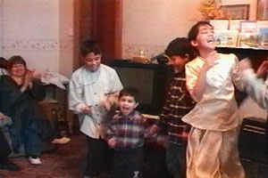 Anwari celebrates with the children