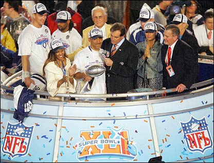 Head coach Tony Dungy of the Indianapolis Colts gets interviewed while holding the Super Bowl Trophy.jpg