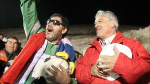 Chilean President Sebastian Pinera with last rescued miner Luis Urzua