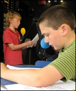Children in the BBC bus radio studio