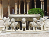 The Court of the Lions, an open space with a fountain surrounded by statues of lions