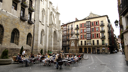 Bar tables in the Plaza Santiago in the Casco Viejo © BBC/Alex Segre. Bar tables in the Plaza Santiago in the Casco Viejo, the old part of town, Bilbao, Vizcaya, Basque Country, Spain