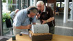 Roy Noble looks at Terry Rogers model of an air raid shelter. 