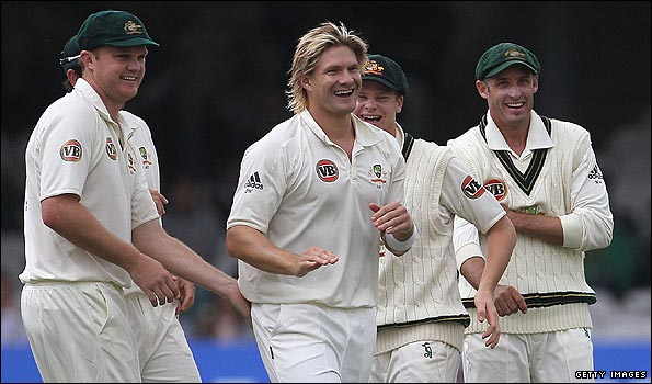 Shane Watson celebrates a wicket with his Australian team-mates
