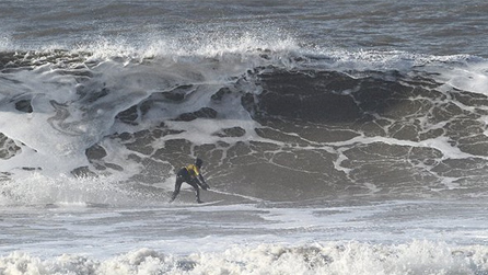 Alex Morrris on a good sized wave during the contest. Image by Claire Beach.