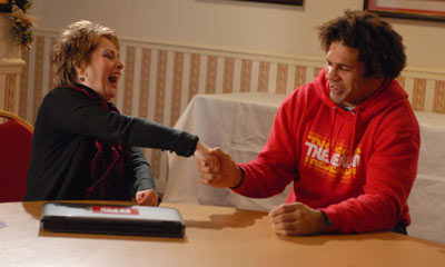 Colin shakes Rebecca's hand