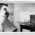 Tom having his hair cut