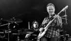 Them Crooked Vultures performing at Reading Festival 2009
