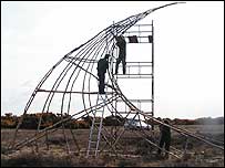 The team work on the Storm Surge sculpture