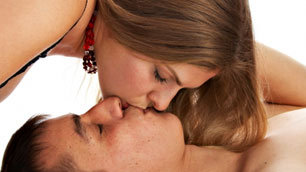 A couple embracing and kissing