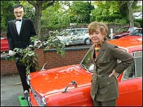 Prunella Scales with a lifesize Basil