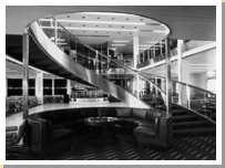 Interior of the QE2 featuring a spiral staircase. 